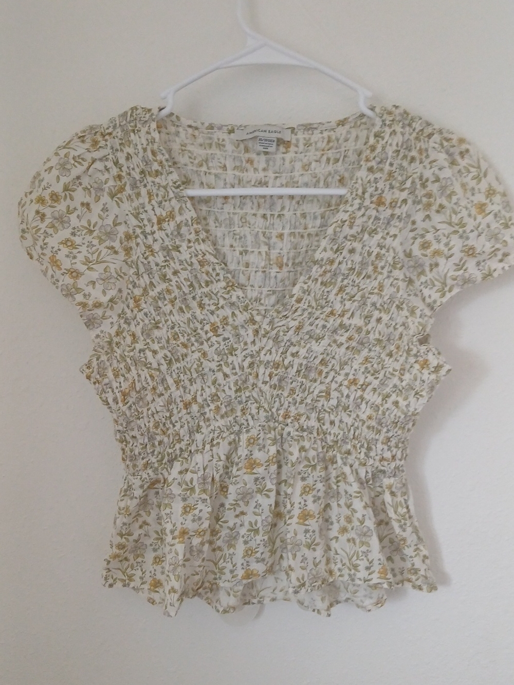 American Eagle Smocked Floral Peplum Top in Cream and Olive